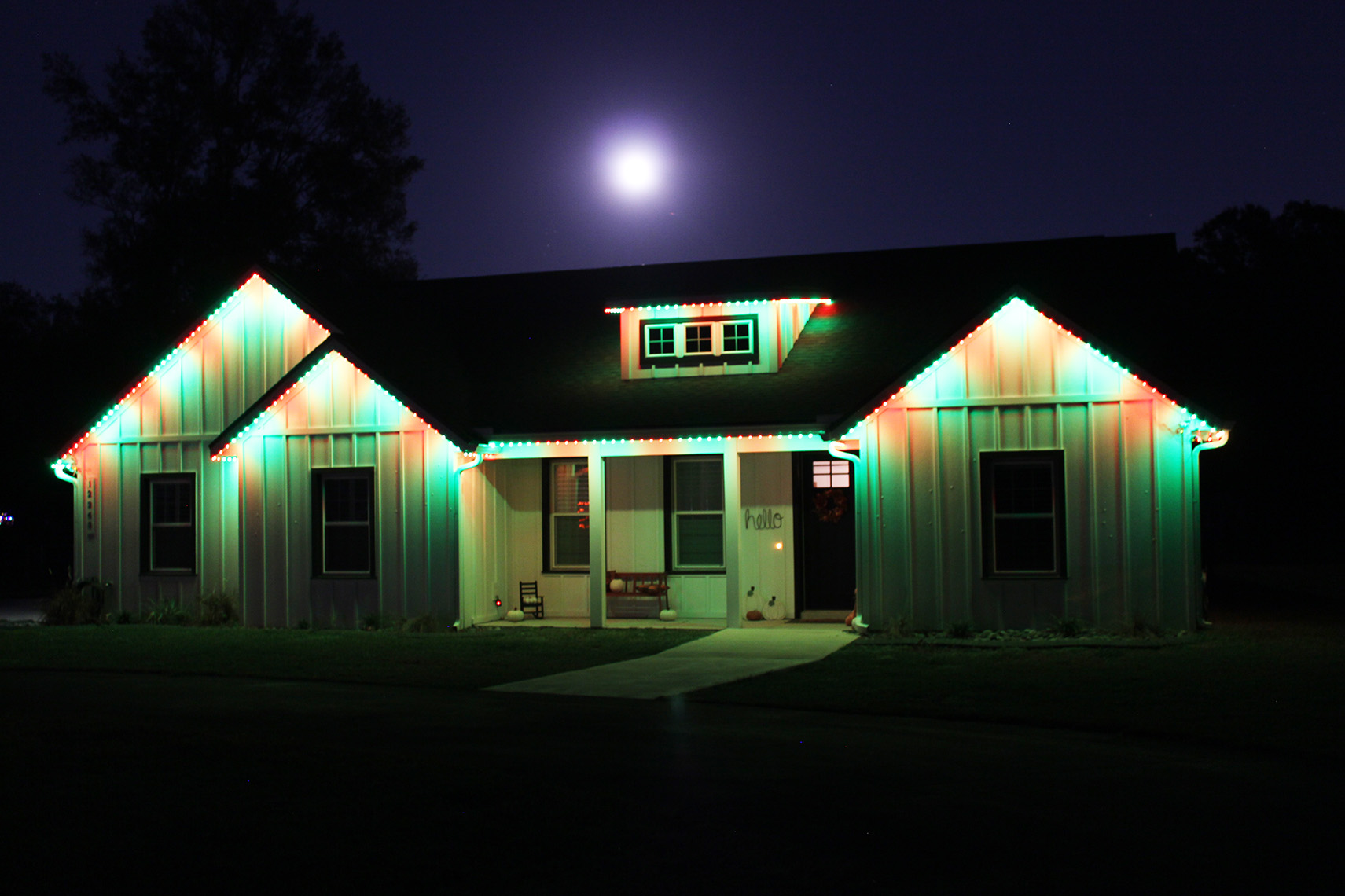 Permanent Christmas lights in red and green on a home in The Villages Permanent Christmas lights in red and green on a home in The Villages